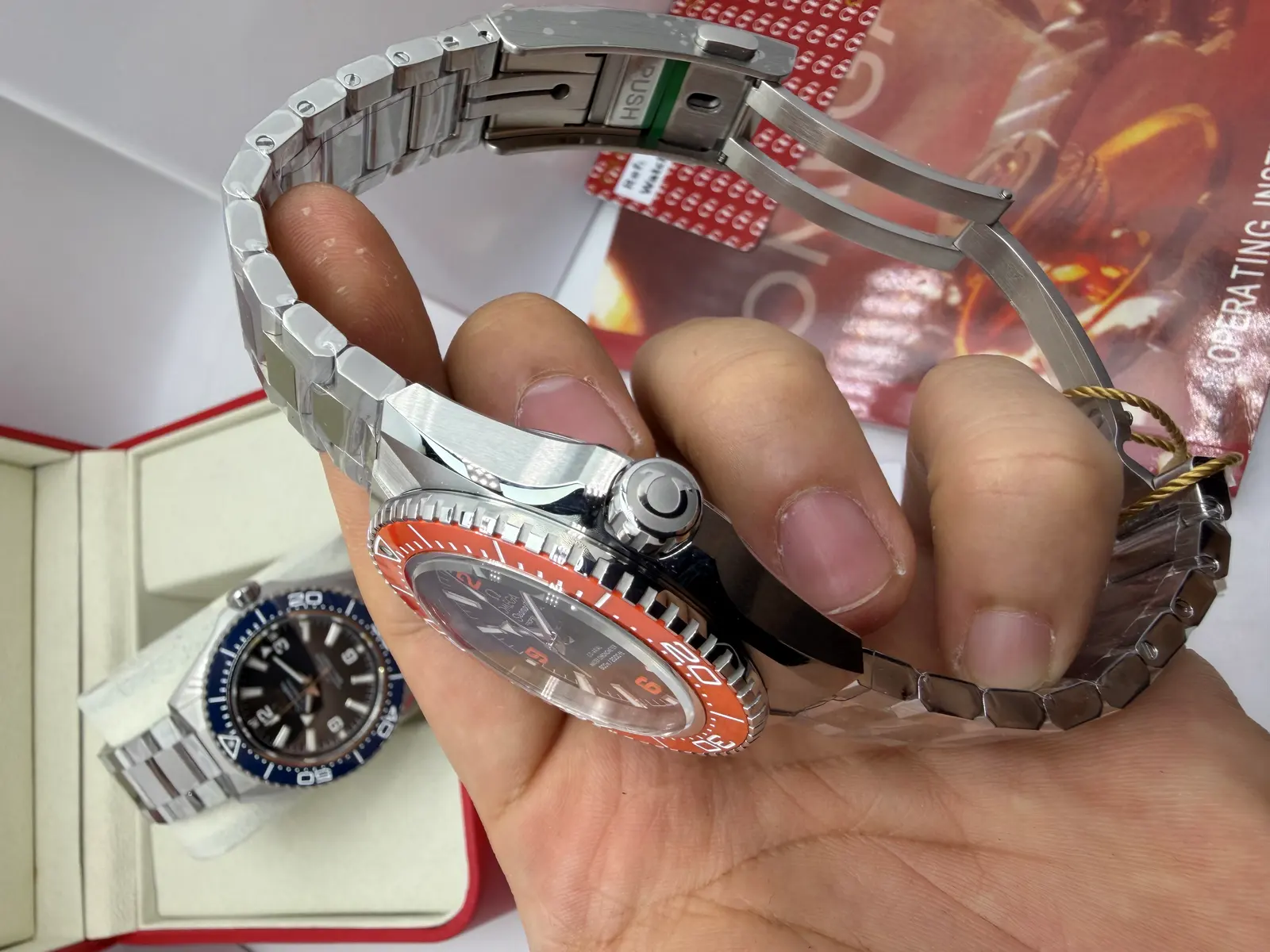 Omega Planet Ocean Bezel Laranja Aço 2026