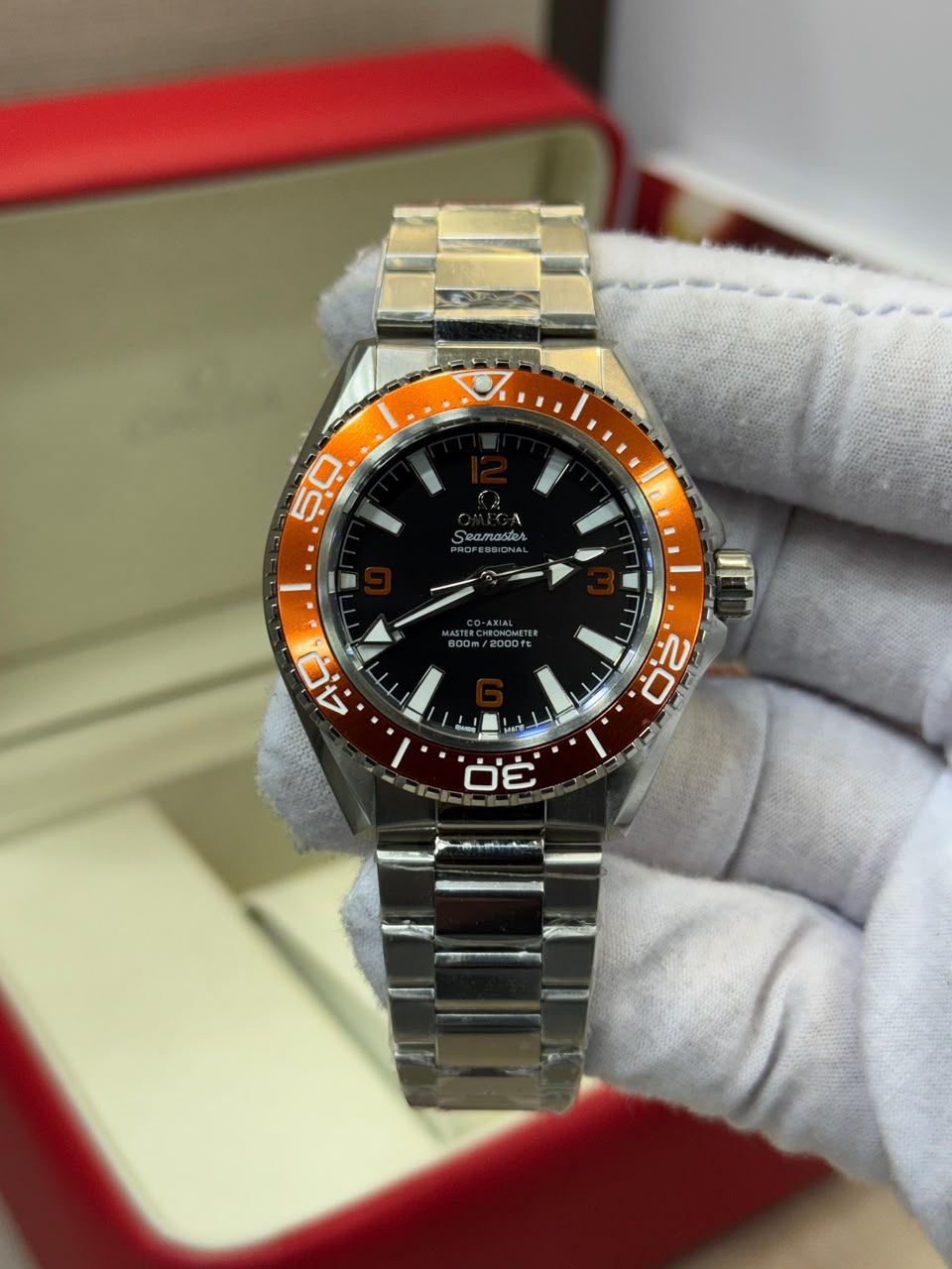 Omega Seamaster Planet Ocean laranja aço